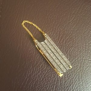 Gold and silver brooch sled